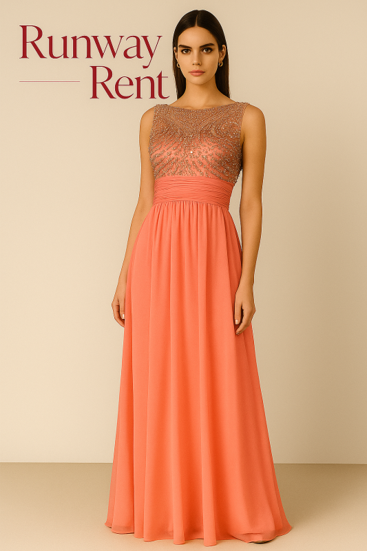 Vestido Color Coral, señido a la cintura, con piedras en la parte superior del busto.