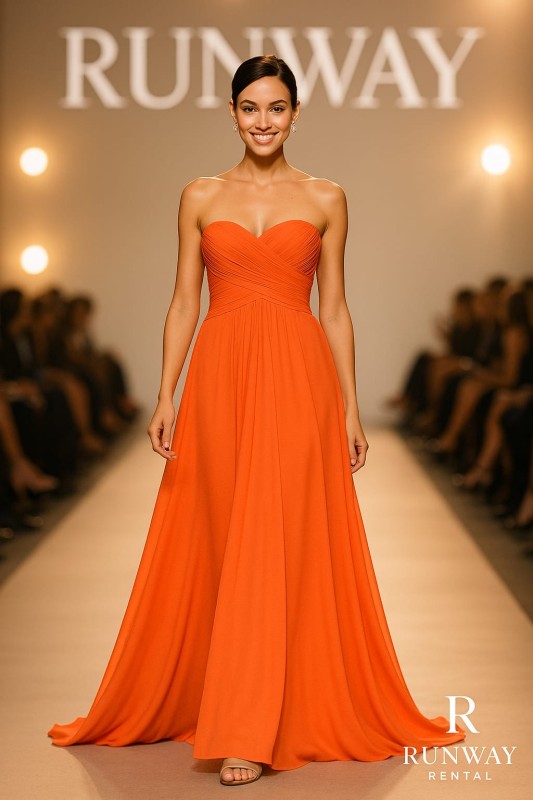 Vestido vaporoso, color melon oscuro, hombros afuera.